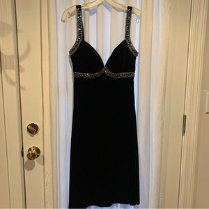 JS Boutique black stretch velvet with silver sequin accent top . Padded bra top